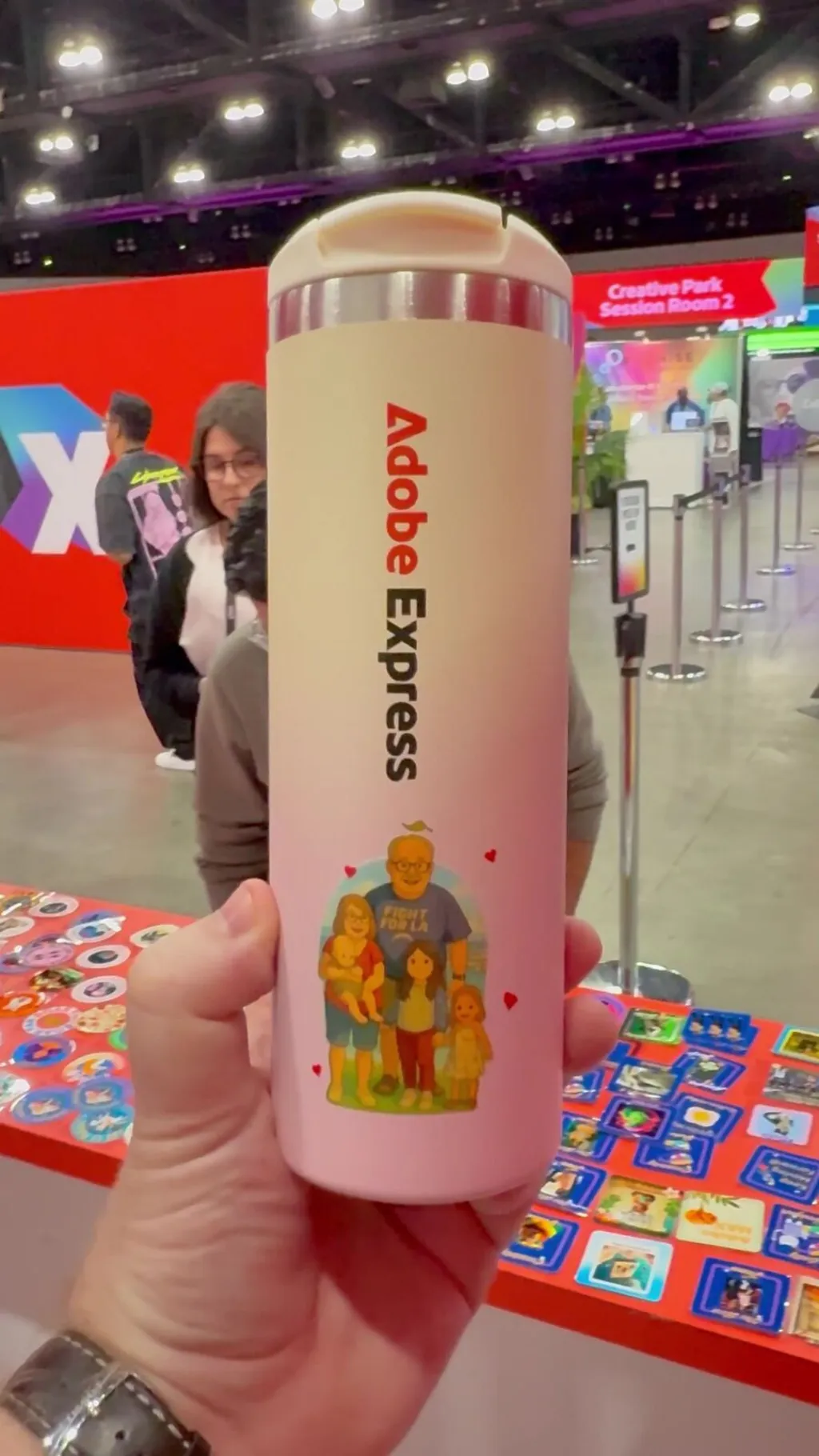 A customized tumbler displayed at an event